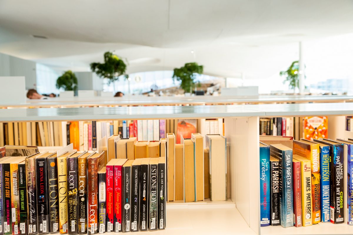 Books in library shelves.